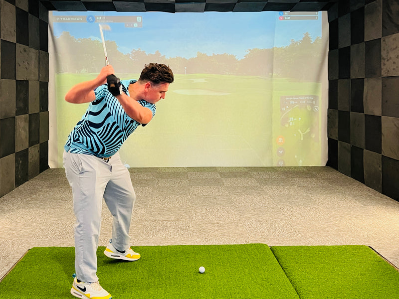 Golfspot indoor golf simulator with player